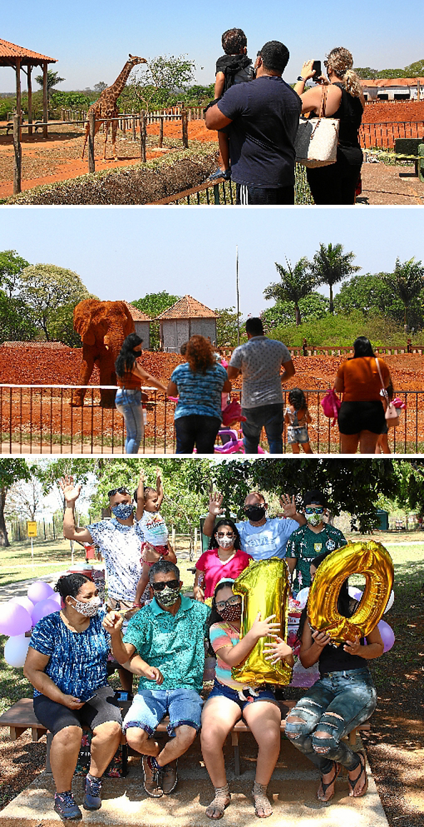 Foram seis meses de separação, mas cheios de saudade. O Zoológico de Brasília reabriu, ontem, após logo período fechado por causa das medidas de prevenção contra o novo coronavírus. E o brasiliense voltou rápido a um dos seus pontos mais amados de lazer. Sob severas medidas sanitárias, mais de 800 pessoas passearam pelos recintos com bichos de todo o mundo. Para a criançada, era difícil saber qual animal escolher. Famílias passaram o dia inteiro no Zoo. Mas a quinta-feira foi especial mesmo para Victorya Souza. A menina fez aniversário e ganhou festa (foto/D) surpresa em seu lugar predileto. , Fotos: Ana Rayssa/CB/D.A Press